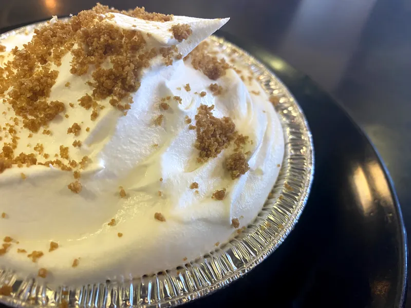 Cookie butter cream pie with a dusting of crushed cookies